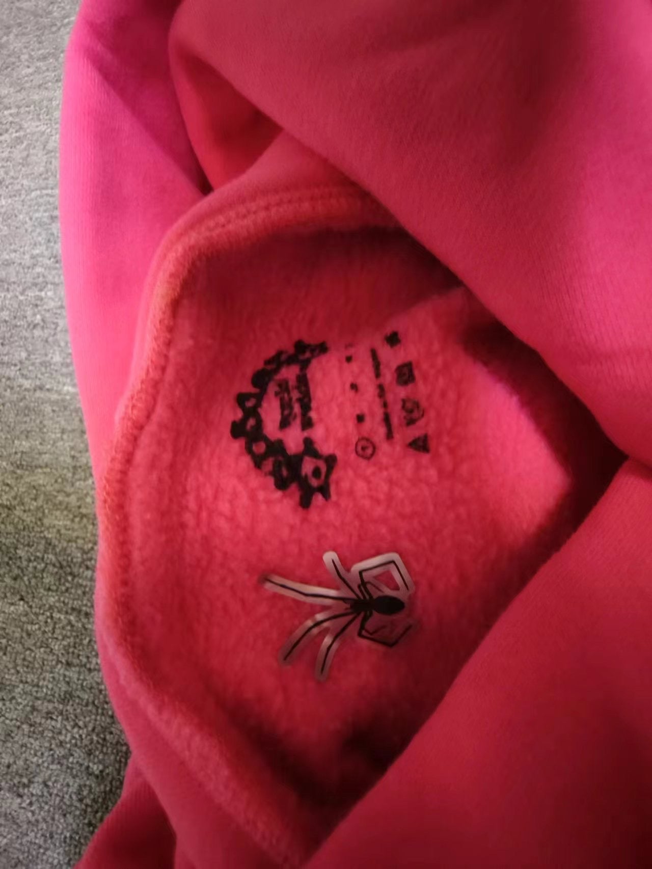 Pink and black Sp5der hoodie